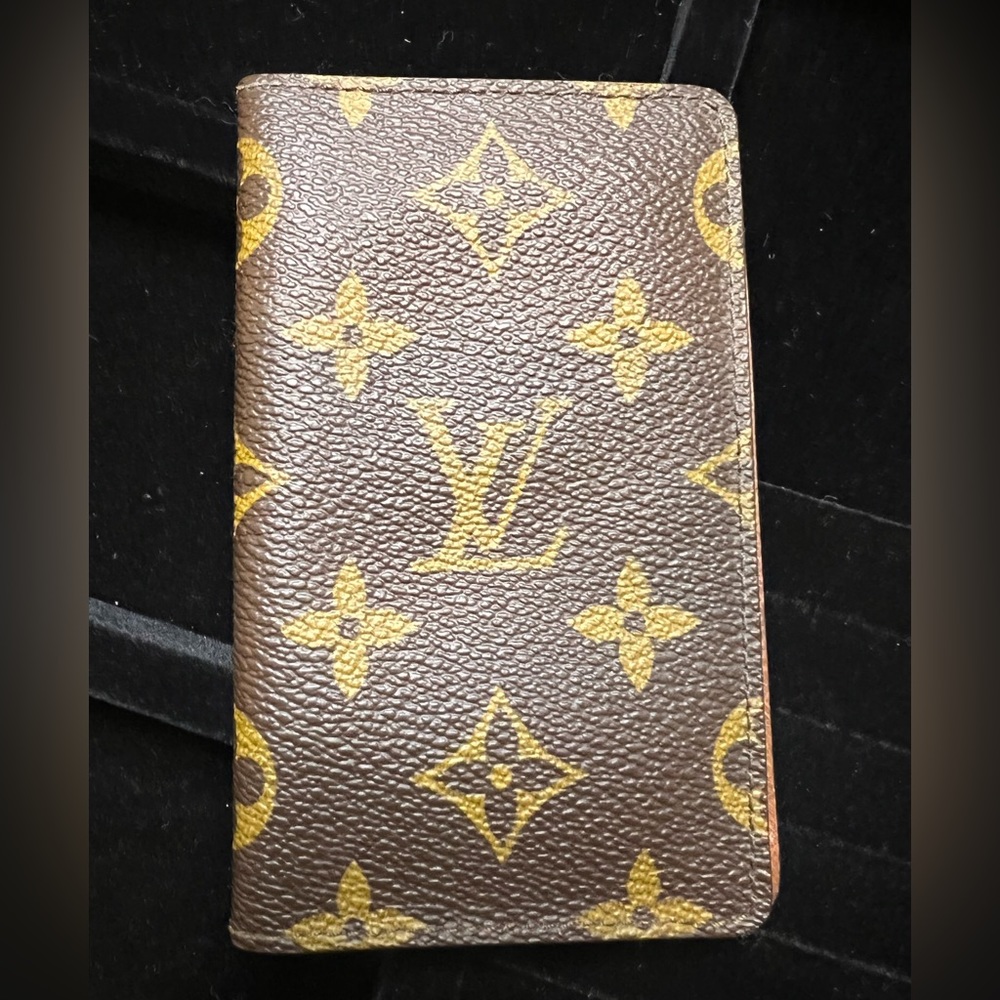 LOUIS VUITTON vintage address book or as a credit card holder.